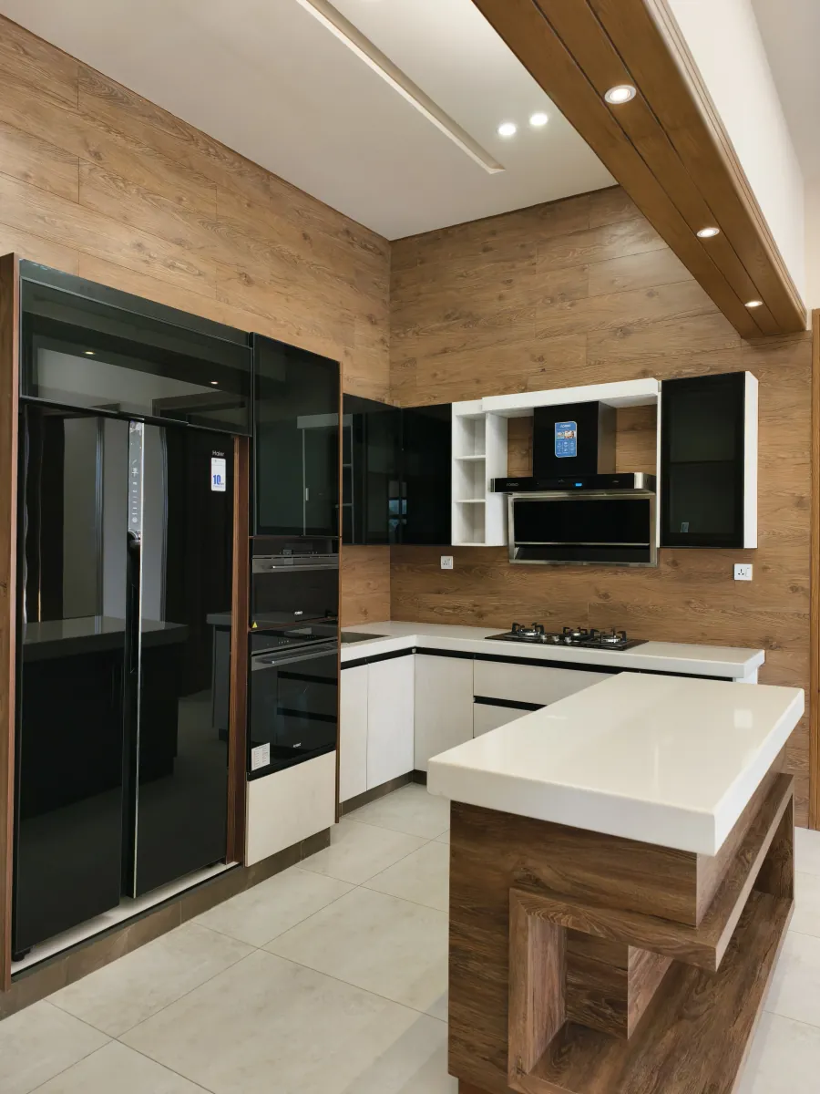 Fitted kitchen — stone-top island and full-height units